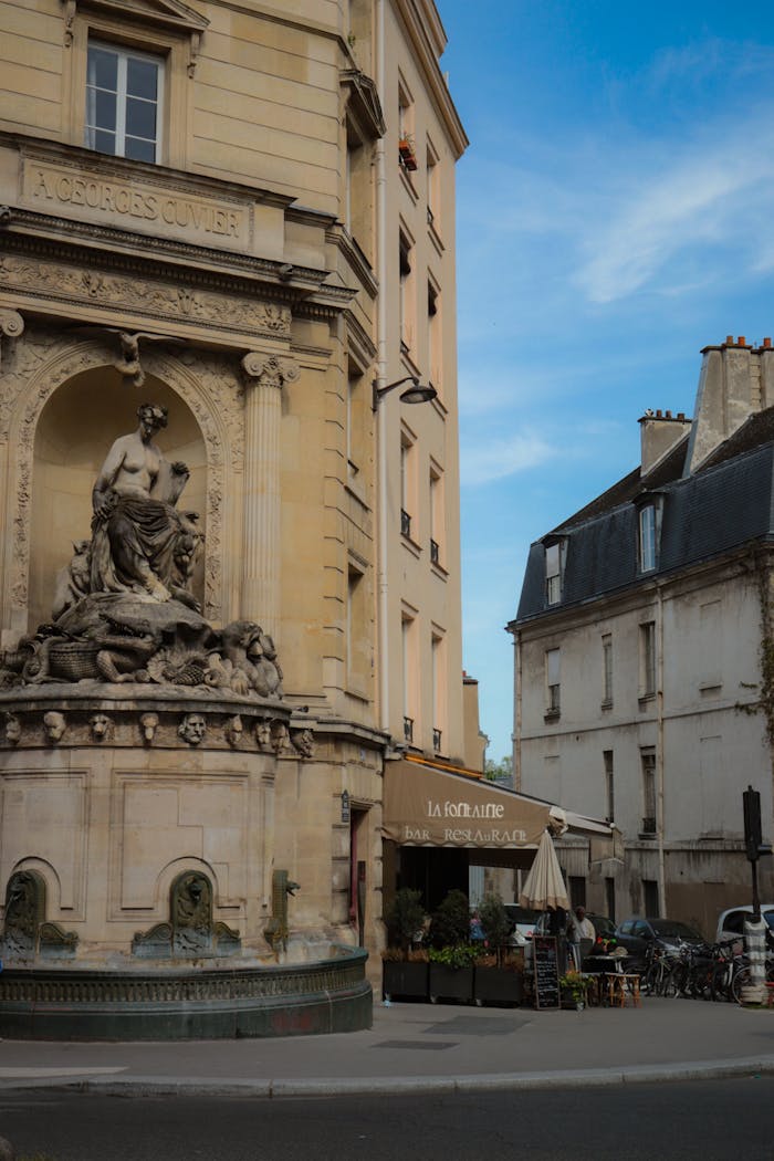 Charming Paris corner with La Fontaine Cuvier and classic architecture.